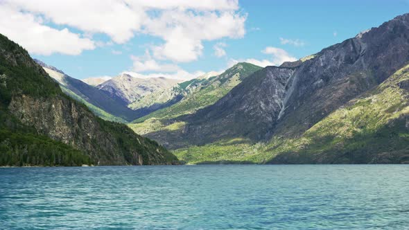 Calm and Majestic Lake By the Mountains and Clouds alt