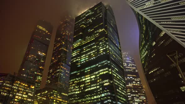 Modern Futuristic Moscow Skyscrapers Moscow City Downtown in Fog at Night Ominous View of Moscow Sky alt