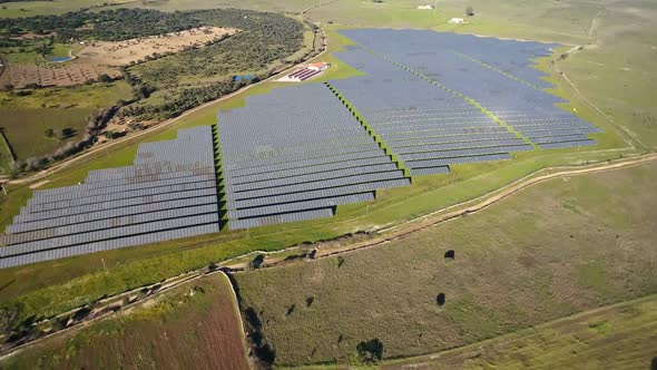 Aerial Top View of Solar Farm with Sunlight Cells for Producing Renewable Electricity