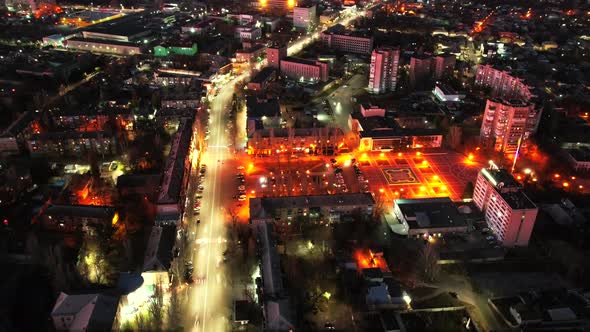Night City View with Bright Street Lights Illuminating Road