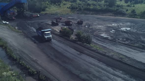 Loading Trucks with Coal Ore