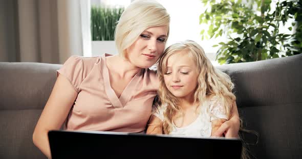 Mother and Daughter with Laptop