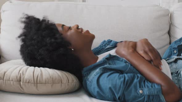 Smiling Serene African Young Woman Head Hits Pillow Stressfree Millennial Female Student Untroubled alt