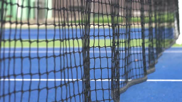 Tennis net blowing in the breeze alt