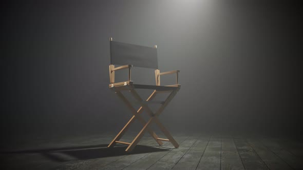 Director chair on a movie set in a dense fog. Climatic, moody, dense atmosphere.