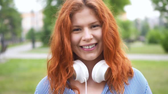 Portrait of Beautiful Red-haired Young Woman Smiling Happy Female  alt