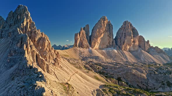 Aerial view of mountain shelter above Tre Cime at sunset alt
