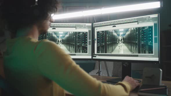 Man Rendering 3D Animation on Computer alt