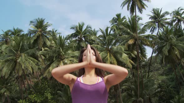 Young woman practicing yoga alt