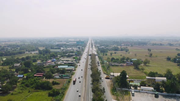 Aerial view of street road with residential buildings, Ratchaburi skyline, Thailand. Urban city