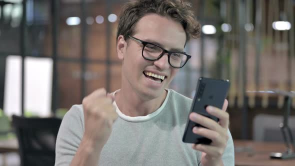 Portrait Shoot of Successful Guy Celebrating with Fest alt