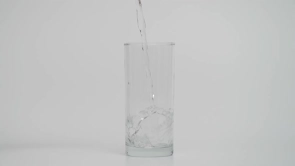 Super Slow Motion of Pouring Water in Transparent Glass Shot at 1000 Fps alt