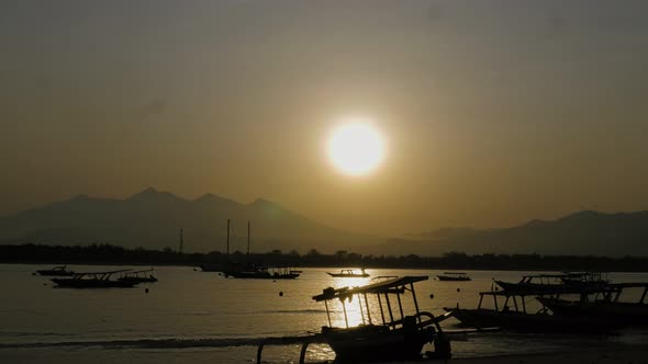 Sunrise Over the Bay with Fishing Boats and Working People. High Quality Timelapse, Shot in 5k alt