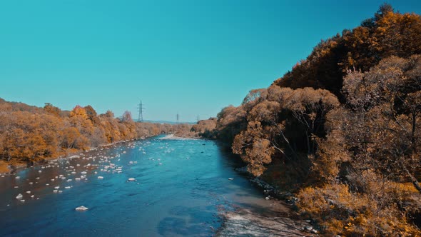 Aerial Footage From Drone Flying Over River Striy in Carpathians Mountains Ukraine alt