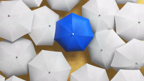 Blue Umbrella Wades Through a Flow of White Umbrellas on a Beach