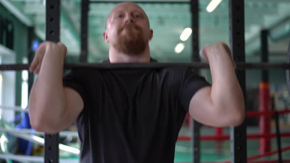 Live Camera Follows Lifting of Barbell By Strong Muscular Caucasian Male Bodybuilder in Gym alt