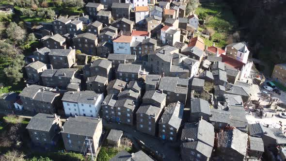 The beautiful village of Piódão in Portugal, with houses made of shale stone alt