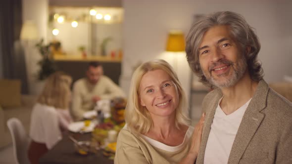 Mature Couple Looking At Camera alt