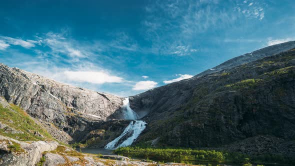 Kinsarvik, Hordaland, Norway. Waterfall Nykkjesoyfossen In Hardangervidda Mountain Plateau. Spring alt