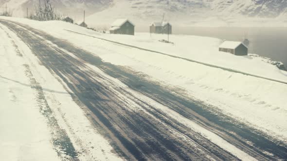 Old Worn Abandoned House in Norwegian Winter Landscape alt