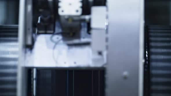 Closeup Tyre Stamping Machine Working Process Spinning Rubber Tape at Factory alt