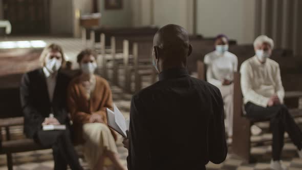 Priest Wearing Mask Preaching Sermon alt
