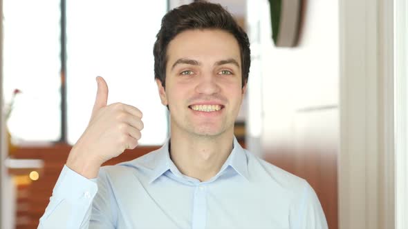 Thumbs Up by Man, Indoor alt