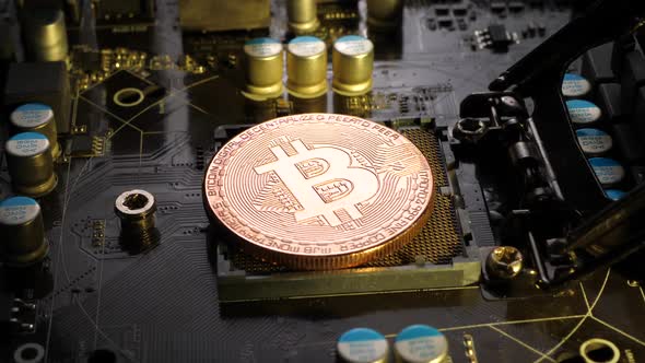Bit Coin Cryptocurrency on Computer Circuit Board