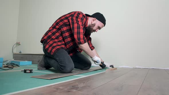 Works Man Installs Laminate, Stock Footage | VideoHive