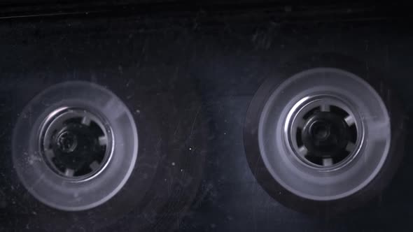 Audiocassette Rotates in Vintage Tape Recorder alt