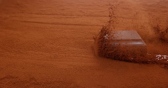 Chocolats Sliping on Black Chocolate Powder, Slow Motion 4K alt