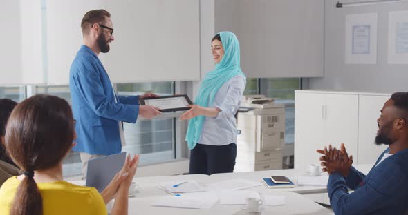 Team Leader Handshake Employee and Giving Certificate Congratulate with Professional Achievement alt