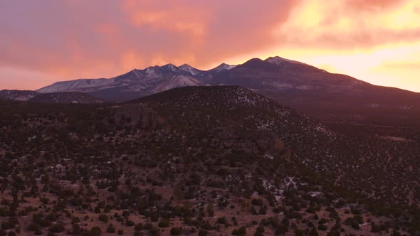 Coconino National Forest and San Francisco Peaks In Arizona At Sunset - Aerial alt