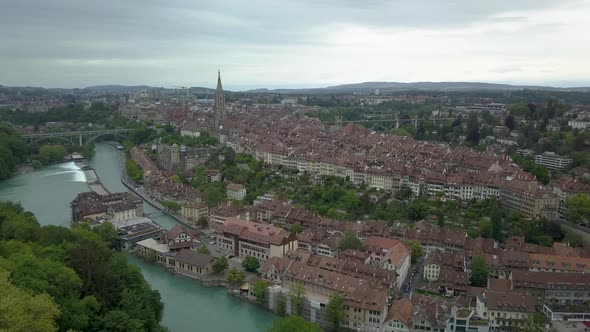 Aerial view of the city of Bern, capital of Switzerland, during a cloudy day in summer. DJI Mavic Pr alt