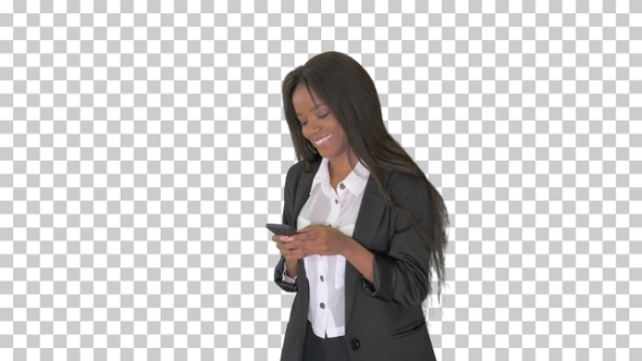 Beautiful black businesswoman texting, Alpha Channel alt
