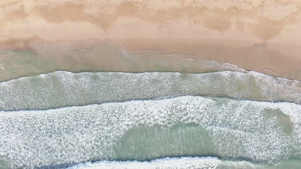 Aerial footage of Caribbean tropical island beach.