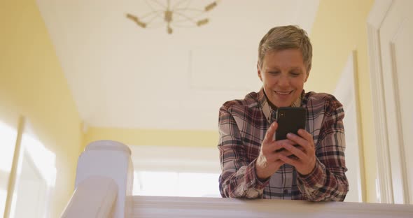 Senior woman at home alone alt