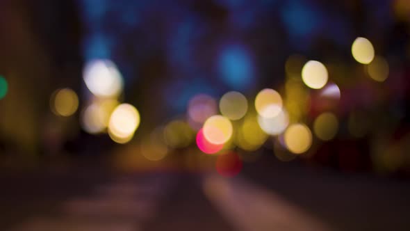 Blurred Lights and Crowds in City alt