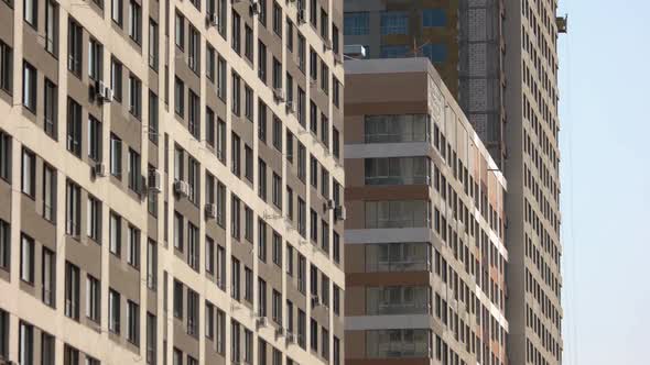 Building Construction of Highrise Skyscrappers with Installed Windows alt