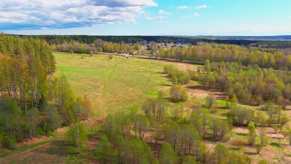 Aerial View of Fields with Forests on a Spring Sunny Day a Magical Landscape with Treetops Lakes in alt