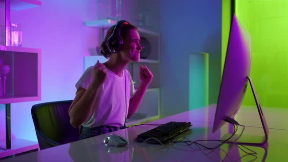 Emotional Player Losing Cyber Tournament Round at Neon Lights Room on Weekend alt