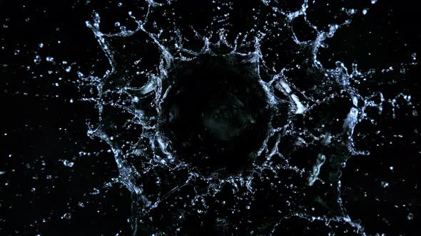 Super Slow Motion Shot of Water Splash Isolated on Black Background at 1000Fps alt