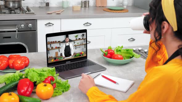 Chef Food Blogger in Laptop Screen Greets Tells Recipe Dish Teaches Housewife alt