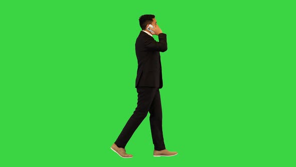 Businessman in Black Suit Walk Talking on Mobile Phone Call Entrepreneur Communicate with Partner on
