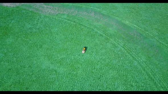 Aerial view scenery of tropical coast beach voyage by turquoise lagoon and white sand background of  alt