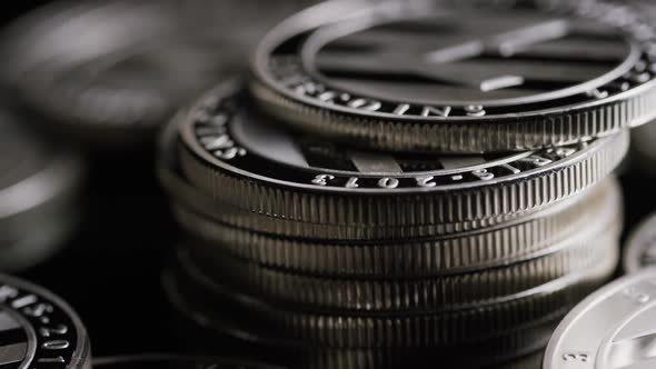 Rotating shot of Bitcoins (digital cryptocurrency) - BITCOIN LITECOIN 386 alt