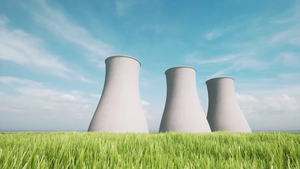 Three Towers Combined Heat and Power Plant on Green Grass Field Nature Landscape alt