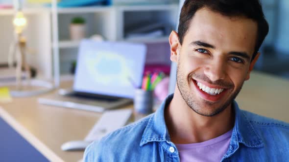 Portrait of smiling executive alt