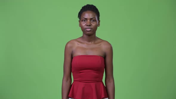 Young Beautiful African Woman with Arms Crossed