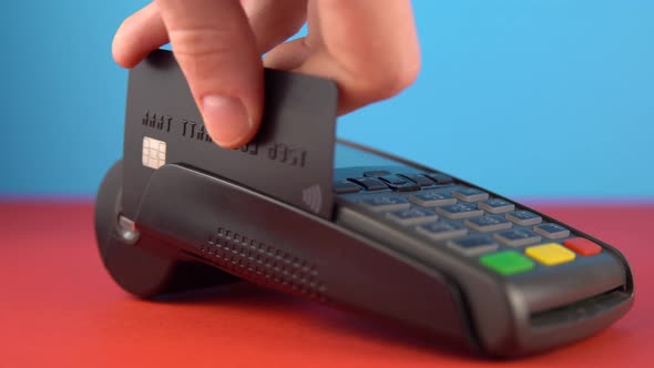 Close Up Hand Making Payment Use Terminal To Pay Account Color Background